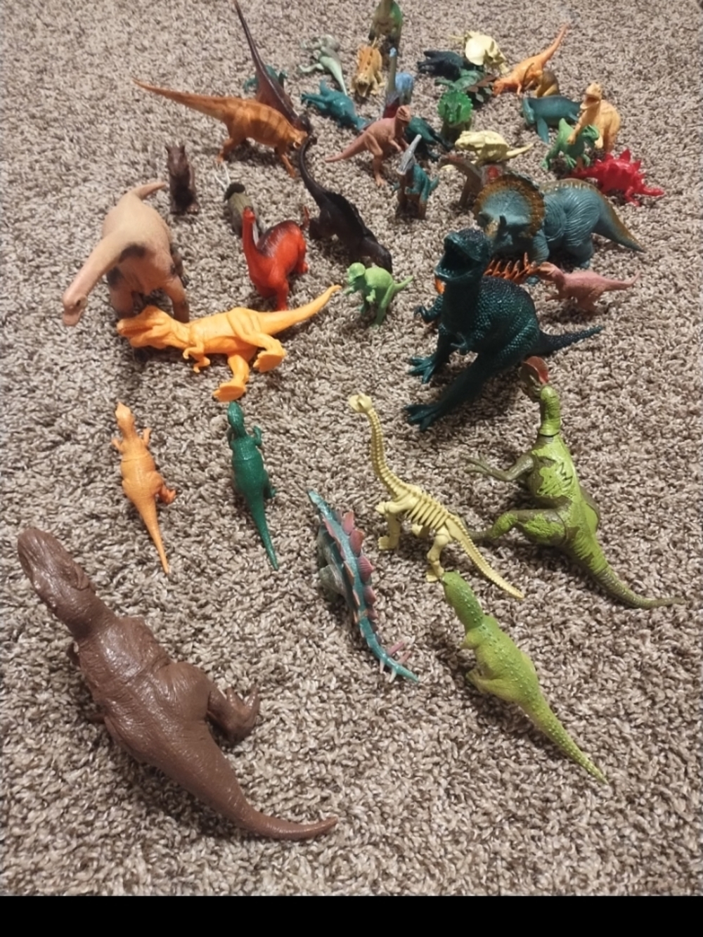 Lot of toy dinosaurs